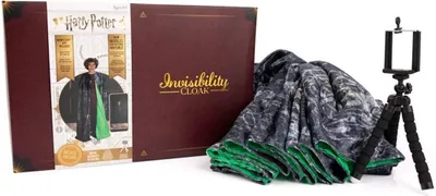 A Harry Potter invisibility cloak set with its packaging and a tripod.