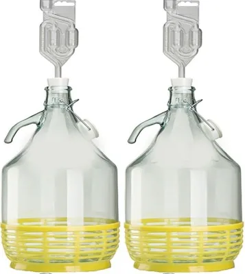 Two glass carboys with yellow protective bases and airlocks are shown against a white background.