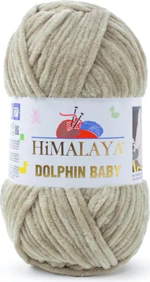 A ball of beige yarn with a label.