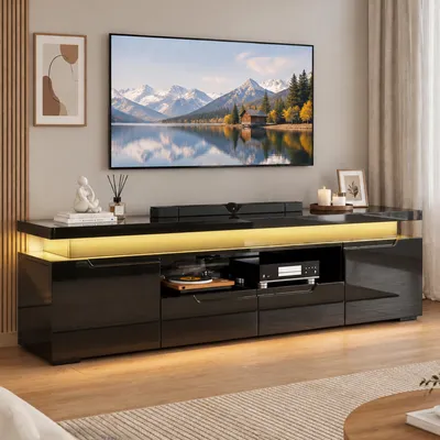 Imagen del producto de Mueble de TV INONEFT con LED y puertos USB/Tipo-C, mueble de TV de 180 cm con acabado brillante, con 2 cajones, 2 compartimentos laterales y un espacio abierto, para televisores de 55–75 pulgadas, color negro
