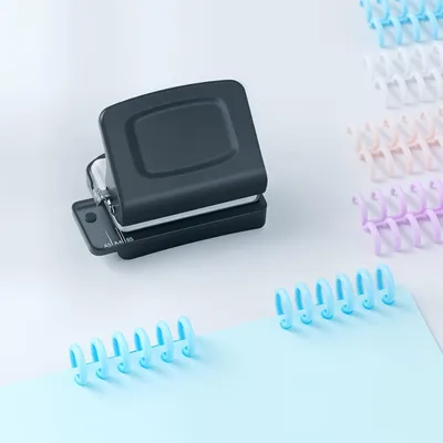 Imagen del producto de Máquina para encuadernación en espiral, modelo Mini, para formatos A4, A5 y B5, con capacidad para 30, 20 o 26 agujeros, incluye 16 hojas, ideal para encuadernación artesanal