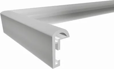 A close-up, angled view of a silver picture frame corner with a white background.