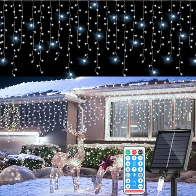 Immagine prodotto di Catena luminosa solare LED Ikodm 15 metri, effetto "pioggia di ghiaccio" con 600 LED, forma di stalattiti, ideale per decorazioni interne ed esterne, luce bianca fredda, con telecomando