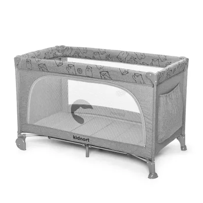 A gray travel crib with a pattern of cartoon animals on the top edge, shown on a white background.