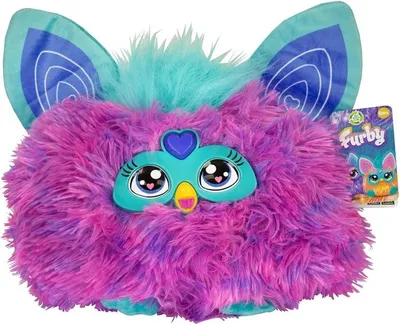 A fluffy toy Furby with large eyes and ears, presented against a white background.