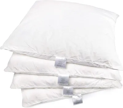 A stack of four white pillows.