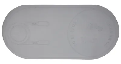 A gray mat with embossed markings.