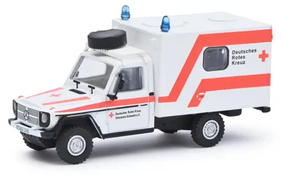 Zdjęcie produktu dla Schuco 452668600 Mercedes Benz G-Class ambulans "DRK" biało-pomarańczowy model samochodu w skali 1:87