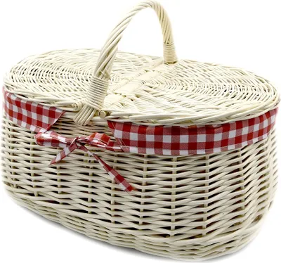 A white wicker picnic basket with a red and white gingham trim and bow.