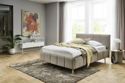 Produktbild von Meise Möbel Polsterbett Alva 140x200 cm | Bettgestell | Kopfteil mit Einzügen | Bouclé-Stoff Cappuccino | Holzfuß eiche