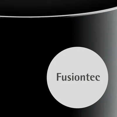 A close-up of a black pot with a white circle containing the text 'Fusiontec'.
