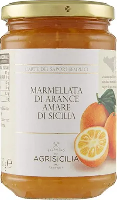A jar of marmalade with oranges and leaves depicted on the label.
