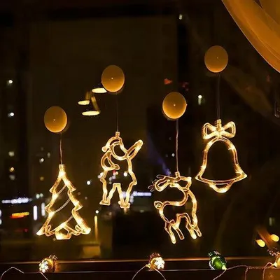Image de Lot de 4 guirlandes lumineuses, blanc chaud, avec des motifs de renne de Noël, de Père Noël et de boule de Noël, guirlande lumineuse avec pinces, adaptée aux fêtes d'intérieur et d'extérieur.