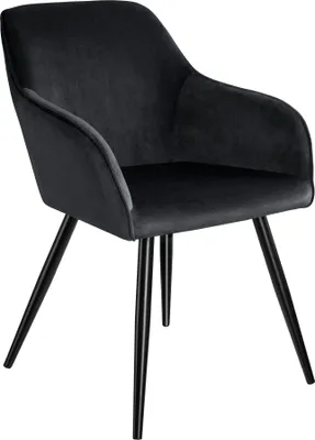 A black velvet dining chair with black metal legs, shown from a three-quarter angle against a white background.