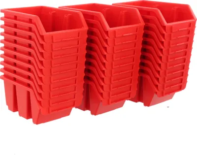 Three stacks of red storage bins.