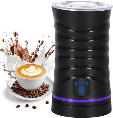 A black electric milk frother is shown next to a cup of coffee with latte art, along with milk and chocolate splashes.