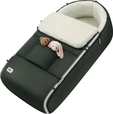 A dark green baby footmuff with a white fluffy lining, shown with a small teddy bear and a bunny toy peeking out.