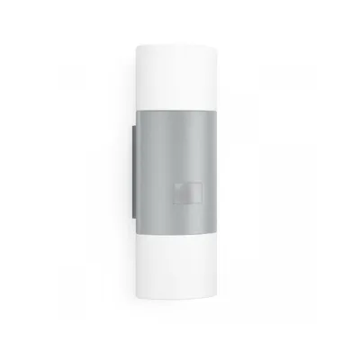 A modern, cylindrical outdoor wall light with white top and bottom sections and a silver middle section with a small, translucent sensor window.