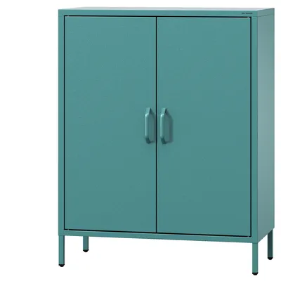 A teal metal cabinet with two doors and handles, standing on thin legs.