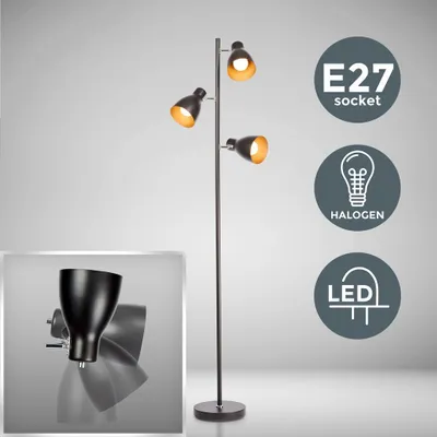 A black and gold floor lamp with three adjustable spotlights, shown against a neutral background with informational icons.