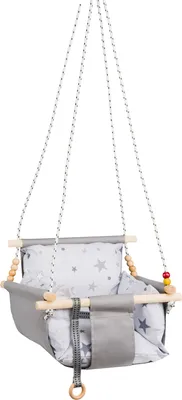 A baby swing chair hanging from ropes.