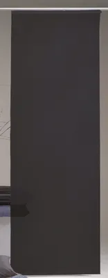 A black roller blind hanging from a white rod.