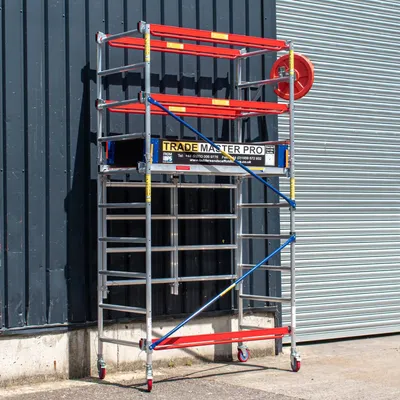 Produktbild von Trade Master Pro® Aluminiumgerüstturm | 4.0 m Arbeitshöhe | Heavy Duty| Höhenverstellbar | Faltbare Basiseinheit | 230 KG Ladekapazität | Einfache Montage | EN1004-