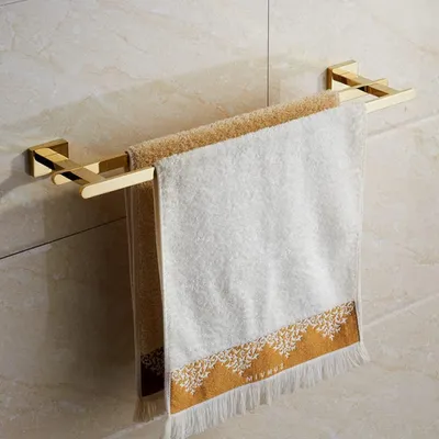 Image de Ensemble d'accessoires de salle de bain avec porte-serviettes doré