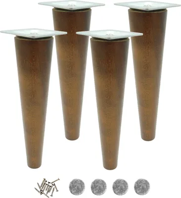 Four wooden furniture legs with silver mounting plates and a pile of screws and felt pads below.