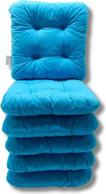 A stack of blue tufted seat cushions.