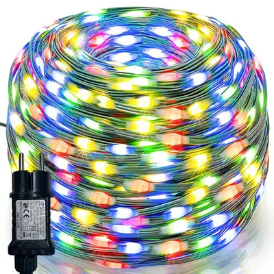 A coiled string of colorful LED lights with a power adapter.