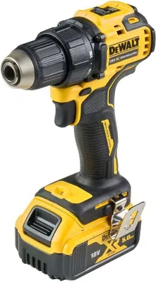 A DeWALT cordless drill with a battery pack attached, shown against a white background.