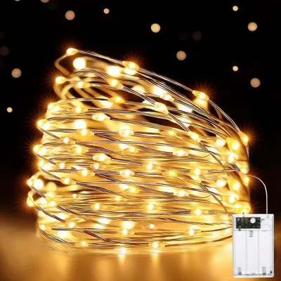 Imagen del producto de Guirnalda de luces de 10 metros con 100 LEDs, alimentada por batería, con cable de cobre. Ideal para interiores