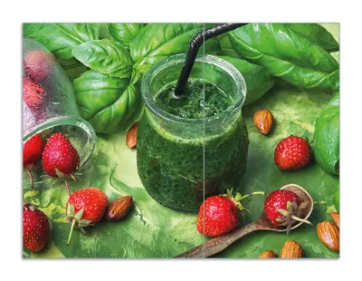 Produktbild von Wallario Herdabdeckplatte aus Glas, Größe 70 x 52 cm 2-teilig, Motiv Grüner Smoothie mit Erdbeeren