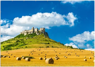 Produktbild von Wallario XXL Outdoor-Poster für Garten oder Balkon, Motiv Alte Burg über Feldern, in ca. 400 x 280 cm