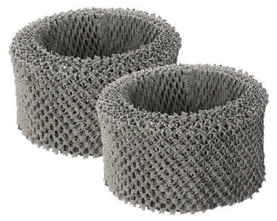 Two grey, honeycomb-shaped humidifier filters are shown against a white background.