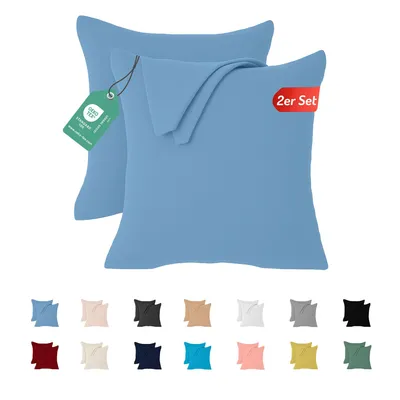 A collage showing a set of pillowcases in various colors, with a main image of two blue pillowcases.