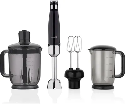 A set of kitchen appliances including an immersion blender, a chopper attachment, whisk attachments, and a measuring cup, displayed against a white background.