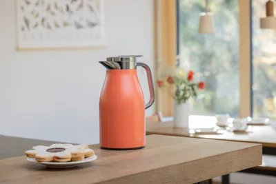 Produktbild von Alfi Skyline, Karaffe, 1 l, Aprikose, Silikon, Polypropylen (PP), Thermoplastisches Elastomer (TPE), Edelstahl, Glas, Rund, Kunststoff
