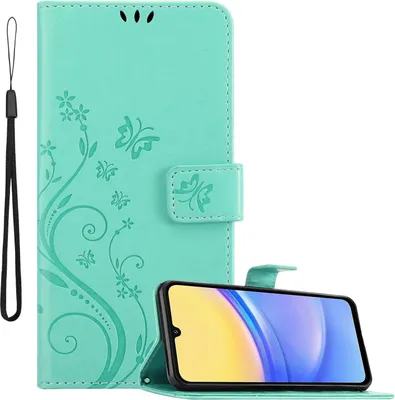 A turquoise flip phone case with a floral and butterfly embossed design, shown open with a smartphone inside, and a wrist strap attached.