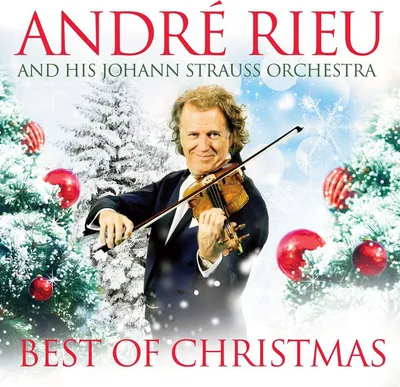 A man playing the violin in front of a snowy Christmas tree background.