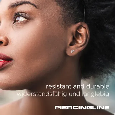 Produktbild von Ohrpiercing Chirurgenstahl Ohrpiercing LOTUSBLÜTE + KRISTALLE