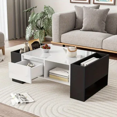 Produktbild von Couchtisch und Wohnzimmertisch – moderner Couchtisch in Hochglanz-Schwarz-Weiß mit Schublade und offener Ablage