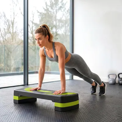 Produktbild von Aerobic Stepper höhenverstellbar, Steppbrett Fitness Cardio, rutschfest Kunststoff, Schwarz/Grün | 80 x 31 cm | 10/15/20 cm | bis 150 kg