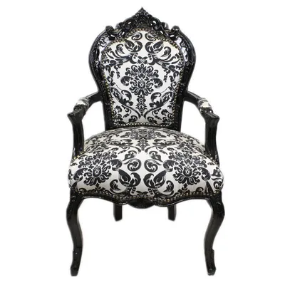 A single baroque armchair with a black frame and black and white floral upholstery, presented against a white background.