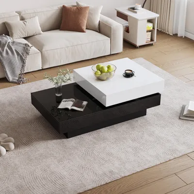 Produktbild von Merax Couchtisch mit drehbarer Tischplatte und 2 Ebenen – Hochglanz Weiß & Schwarz, 103 x 60 x 35,5 cm – Modernes Design & Funktionalität