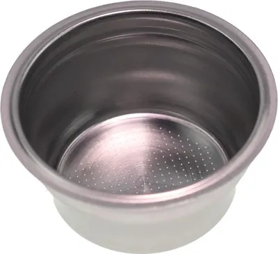 A close-up, top-down view of a stainless steel coffee filter basket.