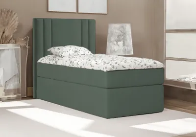 A single bed with a green base and headboard, dressed with a white and gray patterned duvet and pillow, in a room setting.