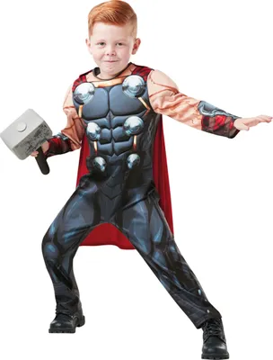 A young boy dressed as Thor, holding Mjolnir.
