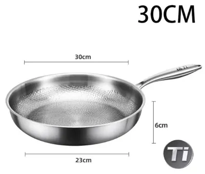 Zdjęcie produktu dla Patelnia Titan – średnica 30 cm – czysta stopa tytanu – powłoka antyadhezyjna bez dodatkowych powłok – struktura przypominająca łuski ryb, tłoczona – stal nierdzewna